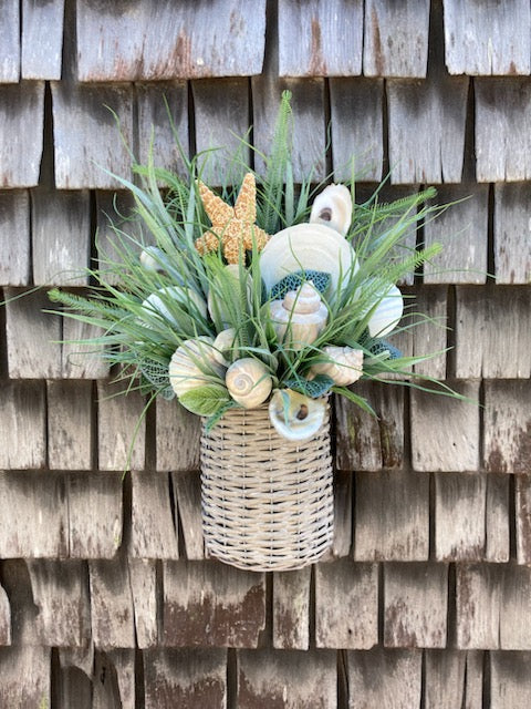 20"Hx16"Wx9"D Shell Wall Basket with grasses, local shells and Sugar Starfish