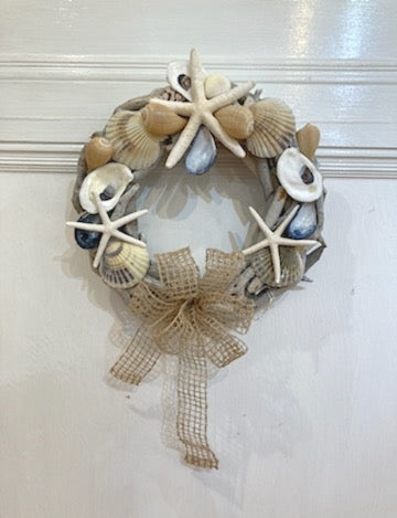 14" Driftwood Shell Wreath with Warm Shells, Finger Starfish and a Jute Bow